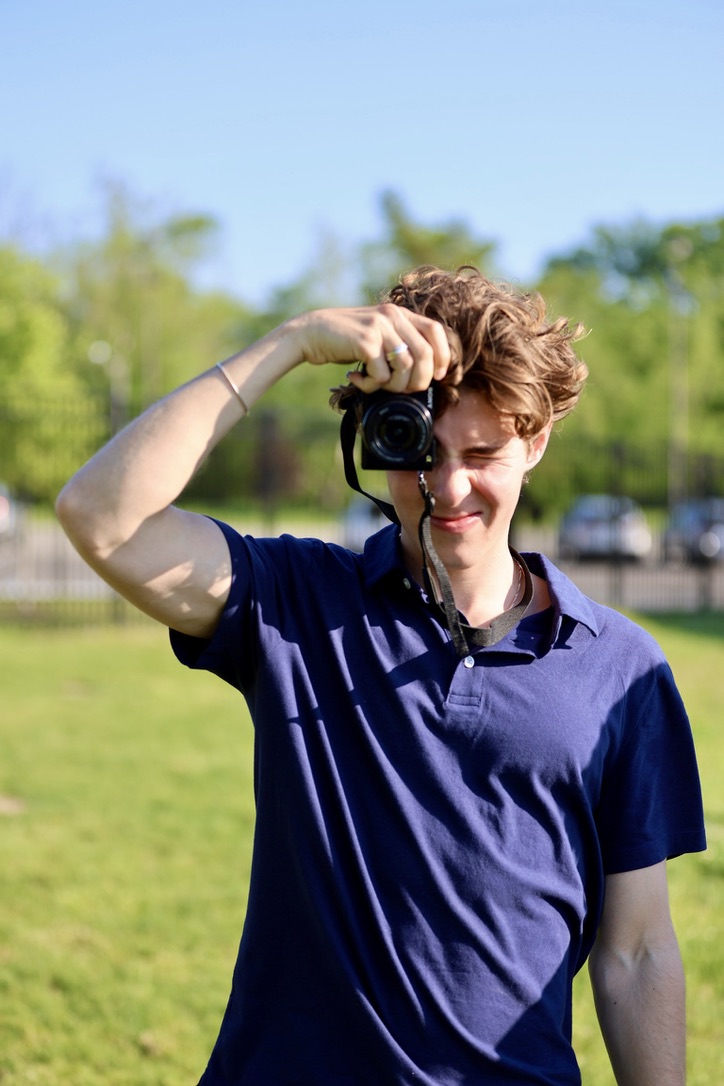 Connor Mallon holding a camera